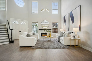 Atherton, CA home staging: Premium property living room with white furniture, fireplace, and modern decor.