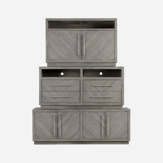 A 74 inch media console made of rustic latte colored acacia wood with a herringbone pattern, featuring metal bar pulls and multiple storage compartments.