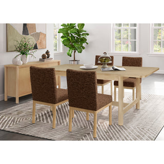A beige Bloomfield dining table with a butterfly extension, made of wood, with rounded corners and tubular  Setup .
