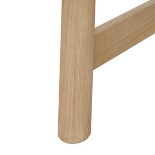 A beige Bloomfield dining table with a butterfly extension, made of wood, with rounded corners and tubular lags.