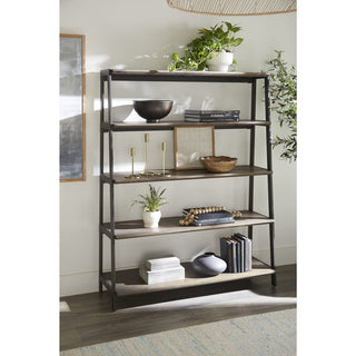 A contemporary Finch wood and metal etagere bookcase in buckwheat color with antique bronze finish, featuring multiple shelves with decorative items and plants.