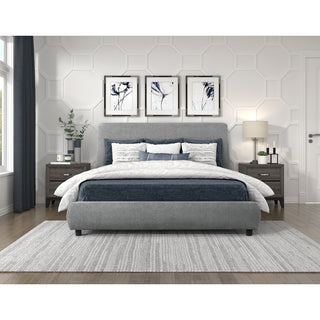 A gray upholstered queen-sized platform bed with a low-profile headboard and footboard, shown with a white mattress on top Full setup .