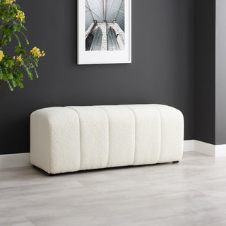 A white faux shearling bench with a channeled pattern and high-density foam padding full set up  .
