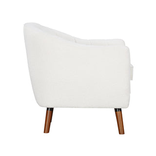 A white upholstered accent chair with channel-tufted backrest, brown-finished solid wood legs, and a removable seat-cushion.