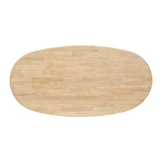 An oval-shaped dining table with a solid wood finish and crescent-shaped legs, having a ridged wood texture top site .