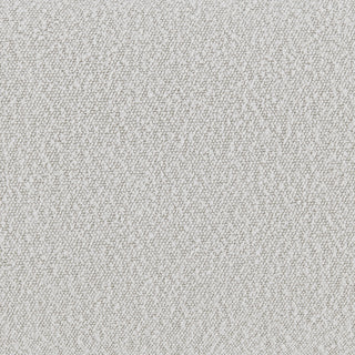 An oval-shaped fabric bench with a smooth, soft texture in a light color, likely white or light gray  Fabrics