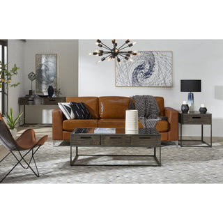 Industrial Modern Living Room – Caramel Leather Sofa with Wood and Metal Coffee Table
