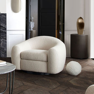 Modern Accent Chair in Minimalist Interior with Dark Wood Flooring

