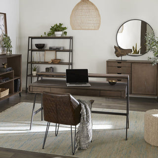 Modern Home Office Setup with Dark Wood Desk, Leather Chair, and Minimalist Decor
