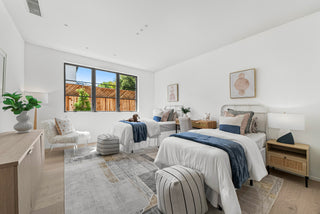 Modern bedroom with two beds, furniture, and decor. with cute interior with air cooler