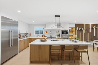 Modern kitchen with stainless steel appliances and wooden cabinets