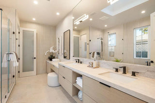Modern kitchen with marble island, stainless steel appliances,  lights gloreous view