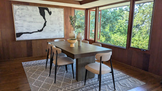 Modern living room with brown leather furniture and abstract arts non that