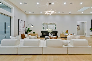 Modern living room with white furniture and decorative elements