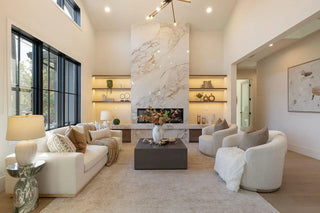 Modern living room with white sofa, armchairs, and decorative elements wall printing