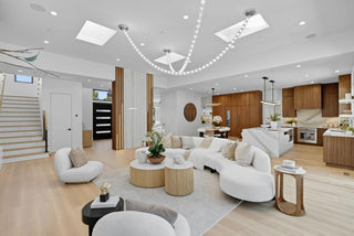 Modern living room with white furniture and wooden accents