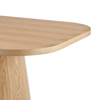 Light oak wood modern table with smooth rounded edges and a stylish tapered base.