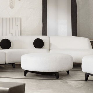 Vesper Round Ottoman in Faux White Shearling with Black Wood Leg Base